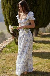 Vestido largo de verano con estampado floral, mangas abullonadas y cuello anudado - Azul